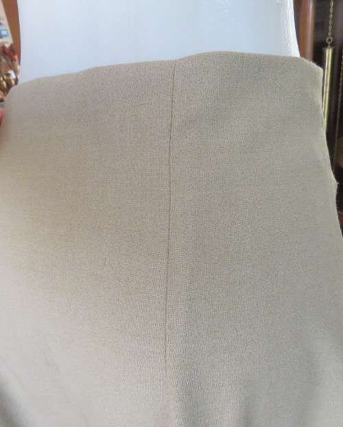 High waisted pickle green bandless button down skirt in heavy polycotton.Low calf length Size 40/16.