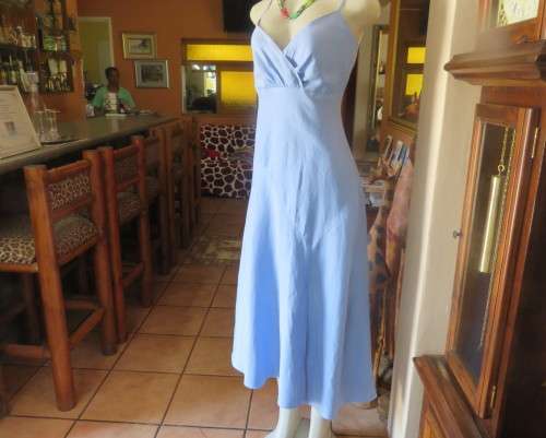Skyblue ankle length linen dress by Oasis in sizec 36/12. Crossover bust with thin straps, As new.