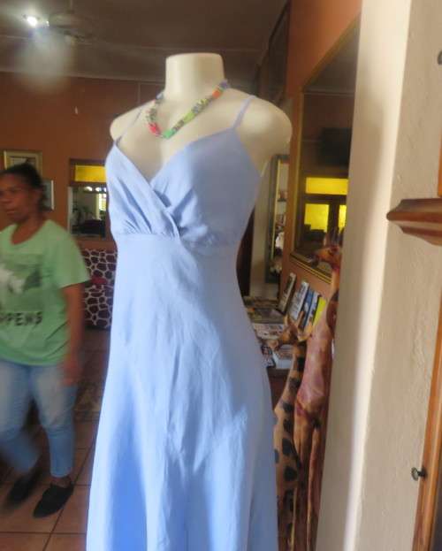 Skyblue ankle length linen dress by Oasis in sizec 36/12. Crossover bust with thin straps, As new.