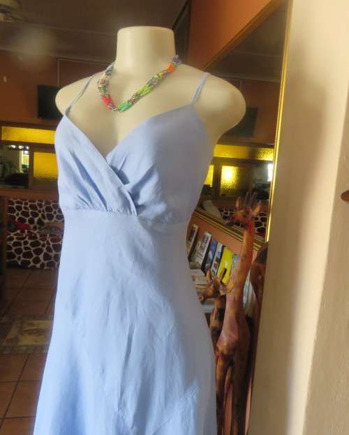 Skyblue ankle length linen dress by Oasis in sizec 36/12. Crossover bust with thin straps, As new.