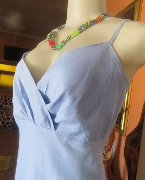 Skyblue ankle length linen dress by Oasis in sizec 36/12. Crossover bust with thin straps, As new.