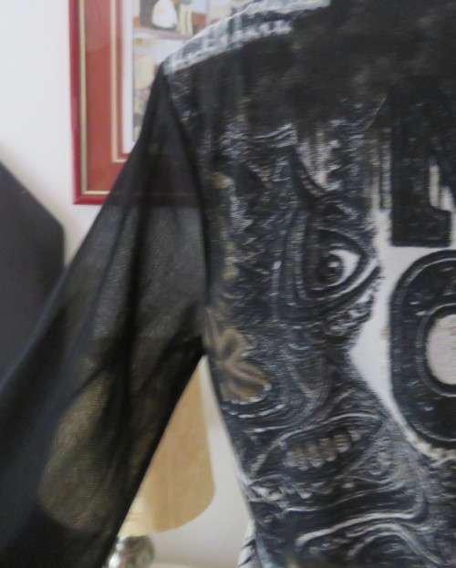 Stunning top by PERUZZI from Ireland. In black netting.2 layers.Top layer printed.Size 36/12.As new
