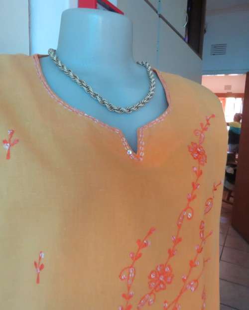 Richly embroidered 100% cotton slip over long sleeve orange top  from INDIA.Size 42 oversized.As new