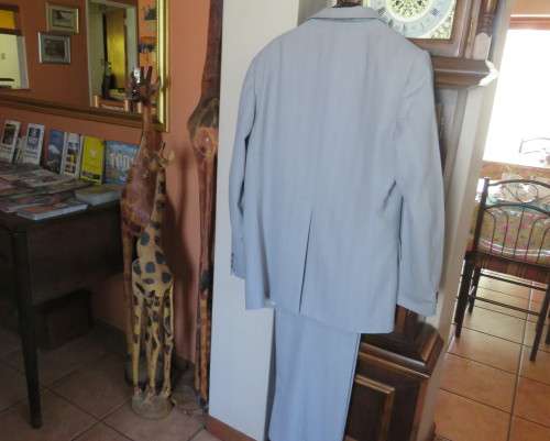 Handsome 2 pc.Men`s light grey striped suit in polyester/new wool blend by MOOD.Jacket 42R.Pants 38