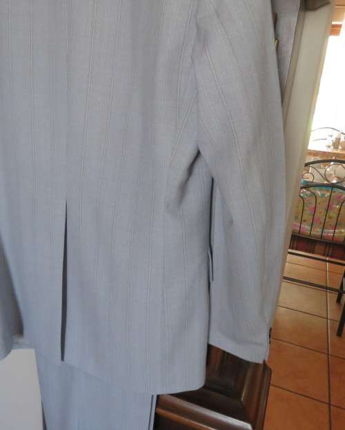 Handsome 2 pc.Men`s light grey striped suit in polyester/new wool blend by MOOD.Jacket 42R.Pants 38