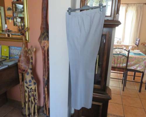 Handsome 2 pc.Men`s light grey striped suit in polyester/new wool blend by MOOD.Jacket 42R.Pants 38