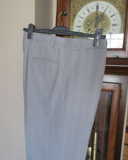 Handsome 2 pc.Men`s light grey striped suit in polyester/new wool blend by MOOD.Jacket 42R.Pants 38