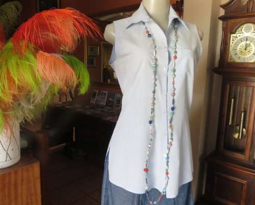 Cool baby blue long sleeveless size 36/12 top by SMILEY.Button down with shirt collar.Polycotton.