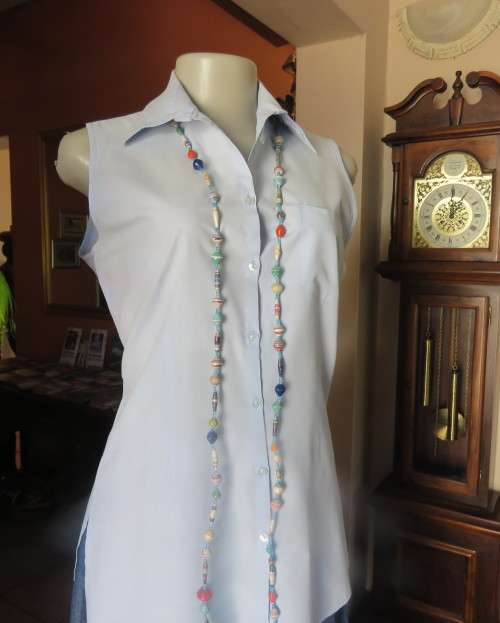 Cool baby blue long sleeveless size 36/12 top by SMILEY.Button down with shirt collar.Polycotton.