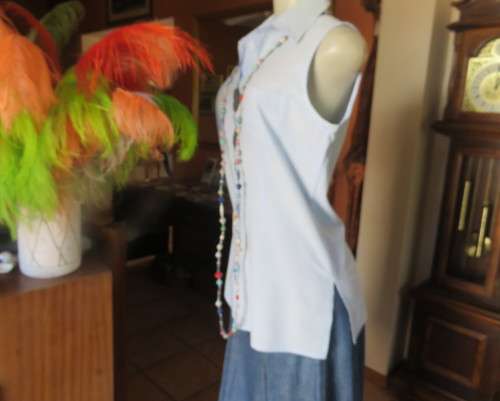 Cool baby blue long sleeveless size 36/12 top by SMILEY.Button down with shirt collar.Polycotton.