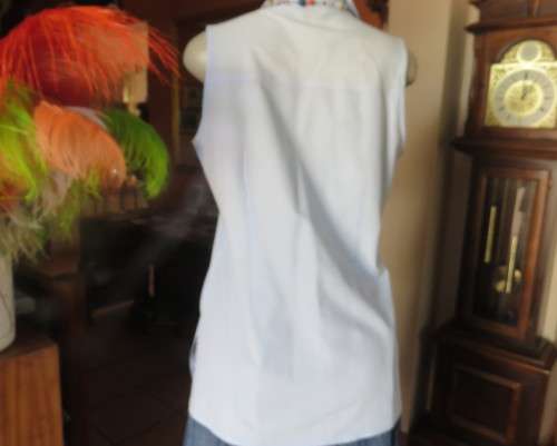 Cool baby blue long sleeveless size 36/12 top by SMILEY.Button down with shirt collar.Polycotton.