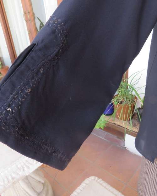Very black long sleeve slip over 100% rayon richly embroidered/sequined top made in India.Size 46/22