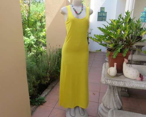 As new buttercup yellow maxi sleeveless dress. Scooped neckline.Size 36/12.Polyester/viscose.
