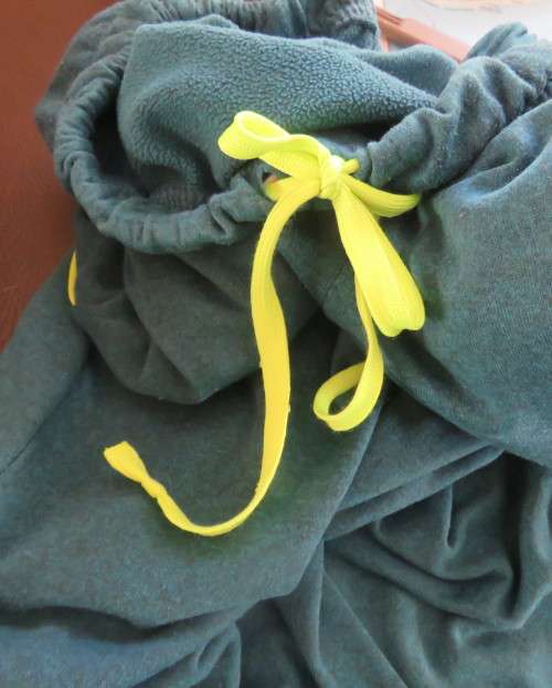 Men`s jade colour brushed polyester sport pants with yellow drawstring and leg edging.By MAXED in L.