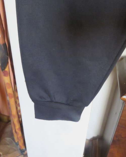 Men`s as new brushed polyester sweatpants. Knitted waist/drawstring and leg cuffs.Size XXL by RED