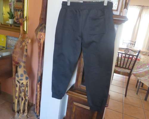 Men`s as new brushed polyester sweatpants. Knitted waist/drawstring and leg cuffs.Size XXL by RED