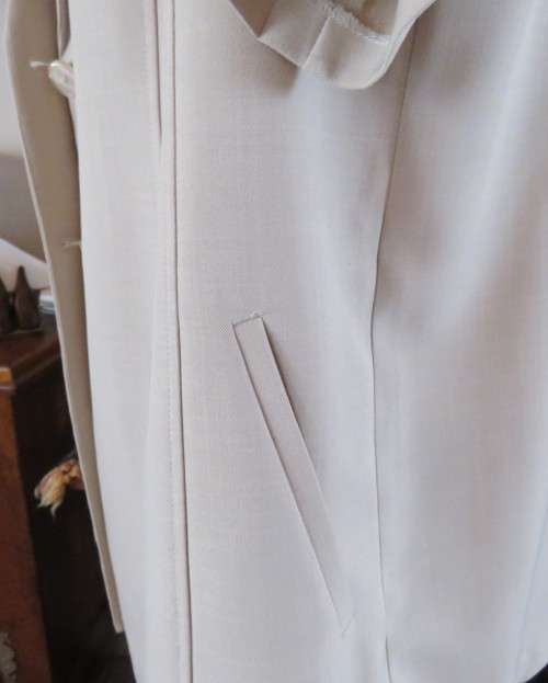 Very smart wheat colour tailored short sleeve 2 button/open collar jacket by ZETA size 46/22.As new.