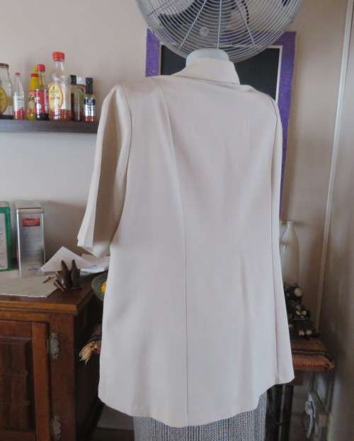 Very smart wheat colour tailored short sleeve 2 button/open collar jacket by ZETA size 46/22.As new.