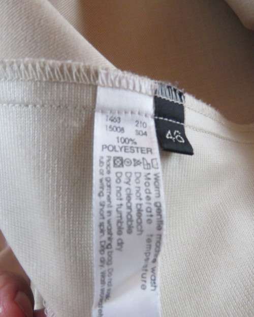 Very smart wheat colour tailored short sleeve 2 button/open collar jacket by ZETA size 46/22.As new.