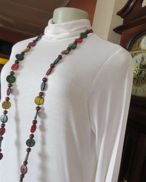 Handy white poloneck long sleeve top in stretch viscose by OR size 40/16.Perfect for under jacket.