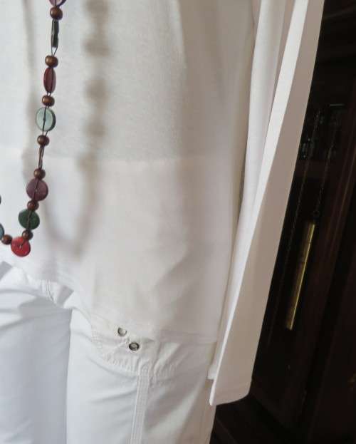 Handy white poloneck long sleeve top in stretch viscose by OR size 40/16.Perfect for under jacket.
