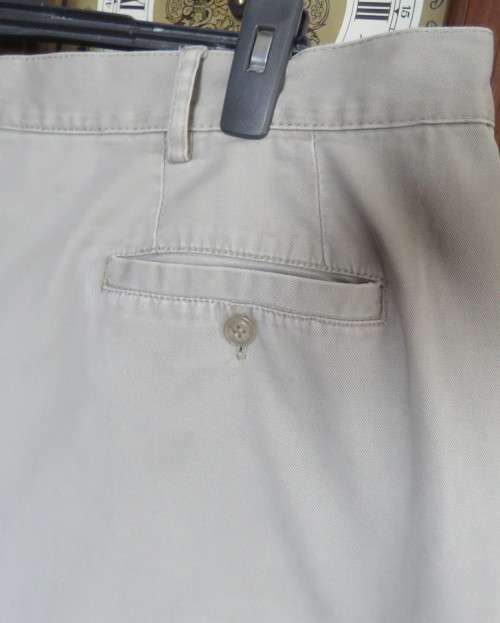 Men`s wheat colour 100% cotton shorts by OAKRIDGE size 42. Pleats on front.Pockets Back/sides.