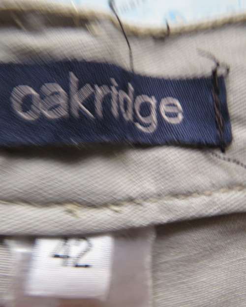 Men`s wheat colour 100% cotton shorts by OAKRIDGE size 42. Pleats on front.Pockets Back/sides.