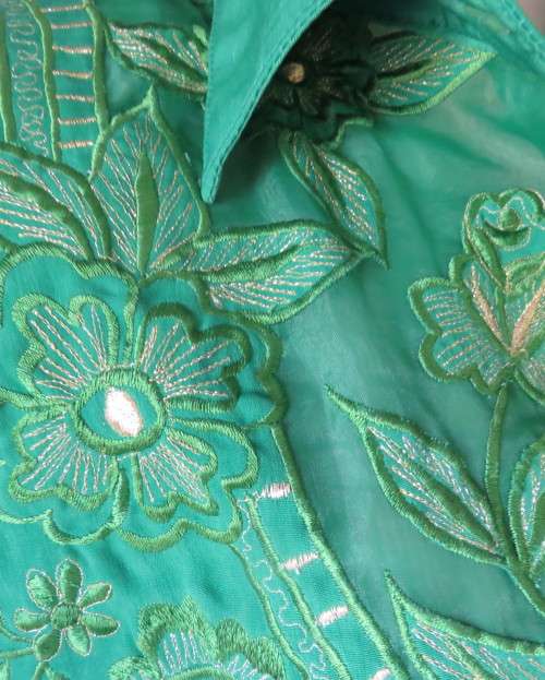 Glamour emerald green long sleeve top with luxury embroidery.Size 48 to 50.Label cut.Very good cond.