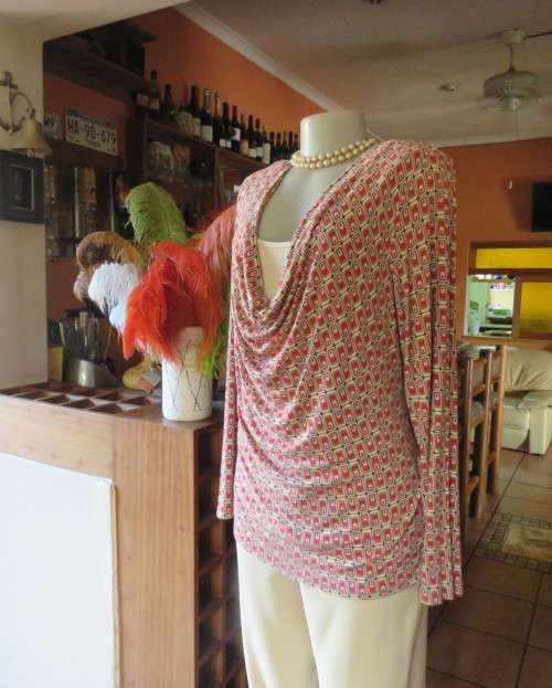 Smart soft long sleeve top in cream/brown/red block pattern.Cream underlay.Size 42/18.Cowl collar.
