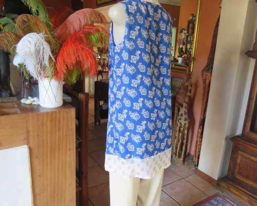 Cool blue white/pink floral knee length sheer polyester top.Stretch poly underlay.Size 36.As new