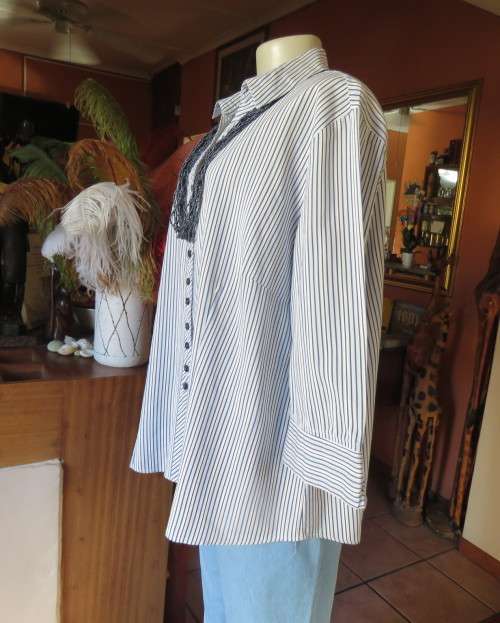 Casual light blue/navy vertical striped button down V neck top with open collar.By PENNY C size 44