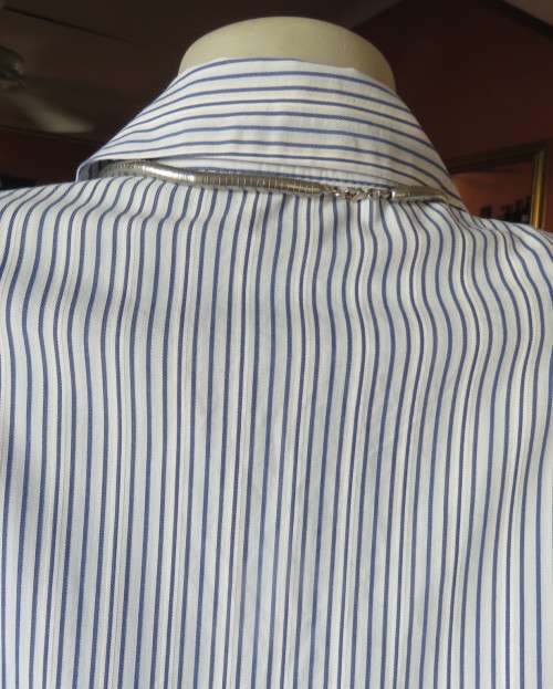 Casual light blue/navy vertical striped button down V neck top with open collar.By PENNY C size 44