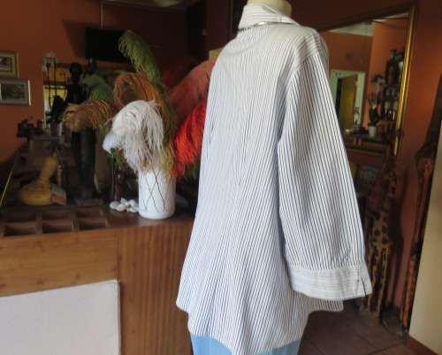 Casual light blue/navy vertical striped button down V neck top with open collar.By PENNY C size 44
