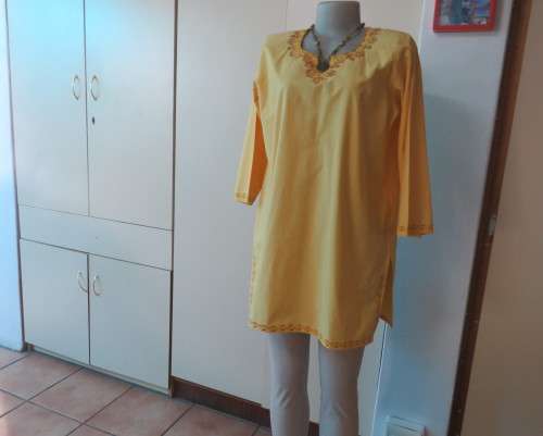 As new buttercup yellow richly embroidered top.Bracelet length sleeves.By BABA forn Kashmi.Size 40