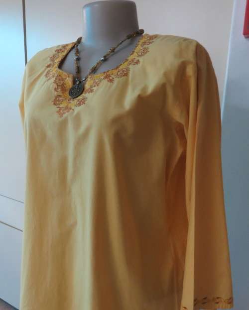 As new buttercup yellow richly embroidered top.Bracelet length sleeves.By BABA forn Kashmi.Size 40