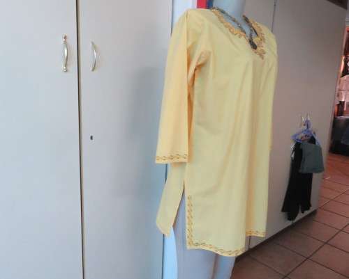 As new buttercup yellow richly embroidered top.Bracelet length sleeves.By BABA forn Kashmi.Size 40
