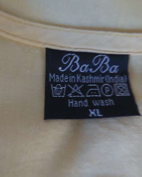 As new buttercup yellow richly embroidered top.Bracelet length sleeves.By BABA forn Kashmi.Size 40