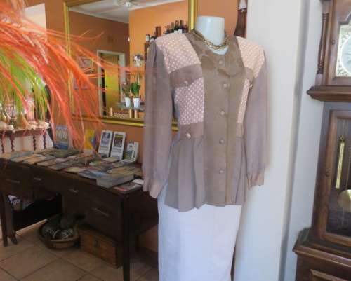 Stunning long sleeve peplum jacket in 6 fabric designs.Collarless.4 dummy pockets.By GARBO FLAIR 42