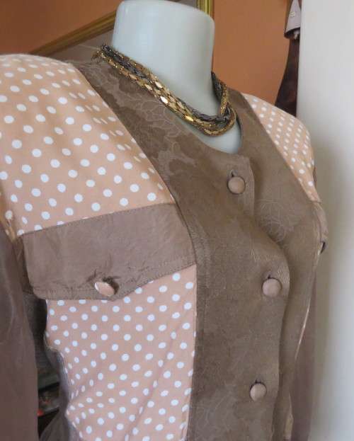 Stunning long sleeve peplum jacket in 6 fabric designs.Collarless.4 dummy pockets.By GARBO FLAIR 42