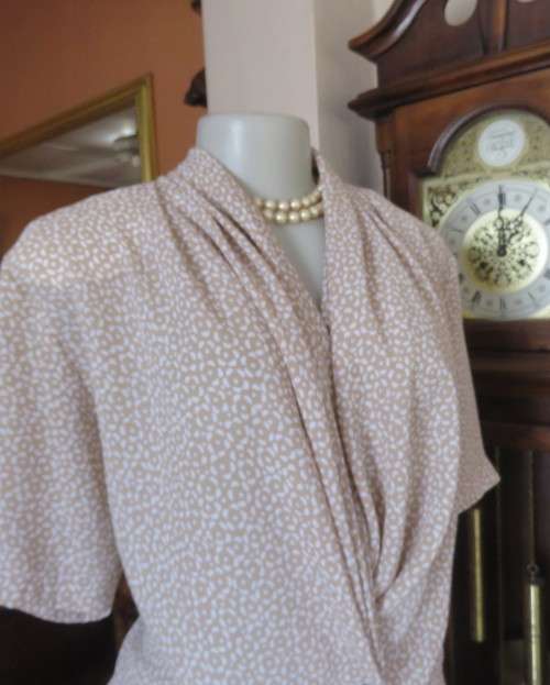 Amazing GIORGIO short sleeve top.Ecru/ tiny white design.Pleats on shoulders.Foldover Size 40