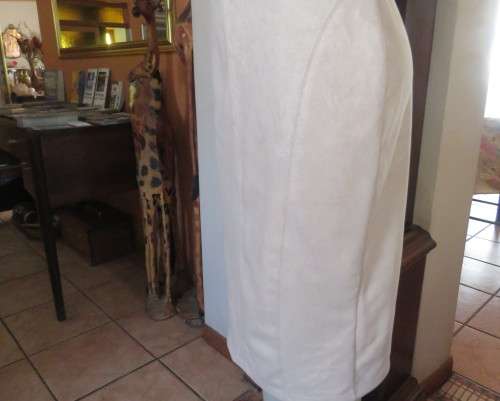 Beautiful wheat colour bandless skirt in stretch polyester with suede look.Size 38/14.New condition.