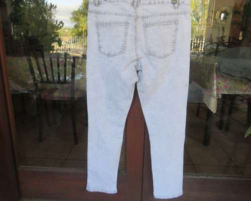 Men`s bleached blue skinny RT jeans size 34 Pockets front and back.Med. rise.Stretch polycotton.
