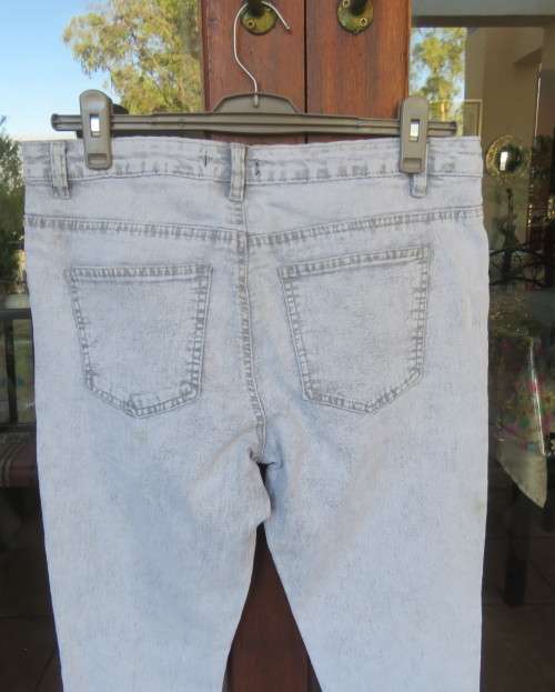 Men`s bleached blue skinny RT jeans size 34 Pockets front and back.Med. rise.Stretch polycotton.