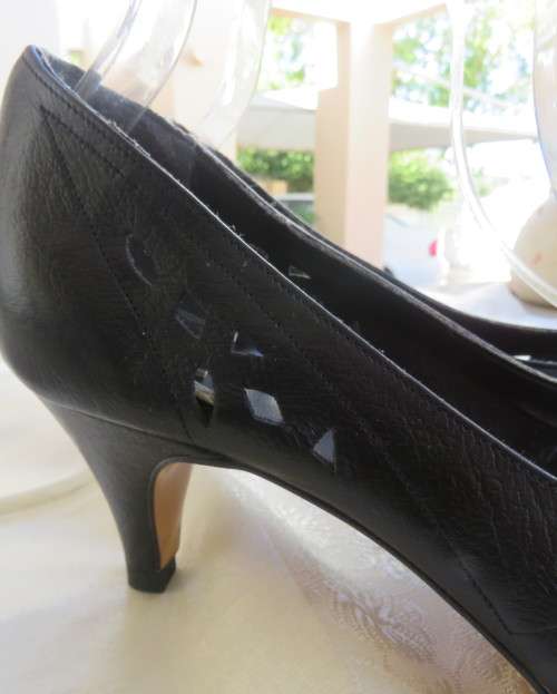 High quality black genuine leather shoes by FEMME Shoes size 6.5.Open toe. Cut-out leather.As new.