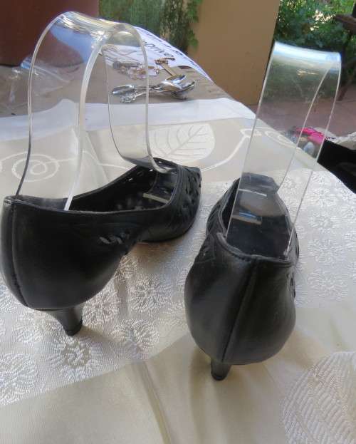 High quality black genuine leather shoes by FEMME Shoes size 6.5.Open toe. Cut-out leather.As new.