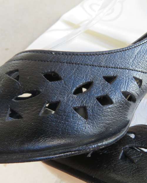 High quality black genuine leather shoes by FEMME Shoes size 6.5.Open toe. Cut-out leather.As new.
