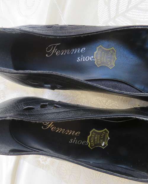 High quality black genuine leather shoes by FEMME Shoes size 6.5.Open toe. Cut-out leather.As new.