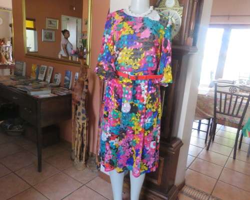 Eye catching vintage sheer polyester dress size 38/14.Bell sleeves.Pleated skirt.Opening at back.