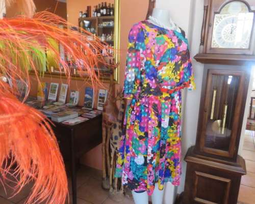 Eye catching vintage sheer polyester dress size 38/14.Bell sleeves.Pleated skirt.Opening at back.