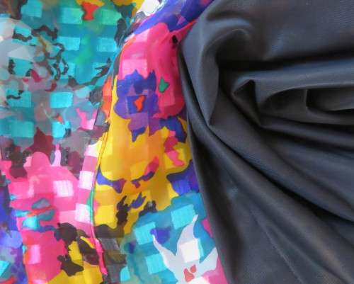 Eye catching vintage sheer polyester dress size 38/14.Bell sleeves.Pleated skirt.Opening at back.